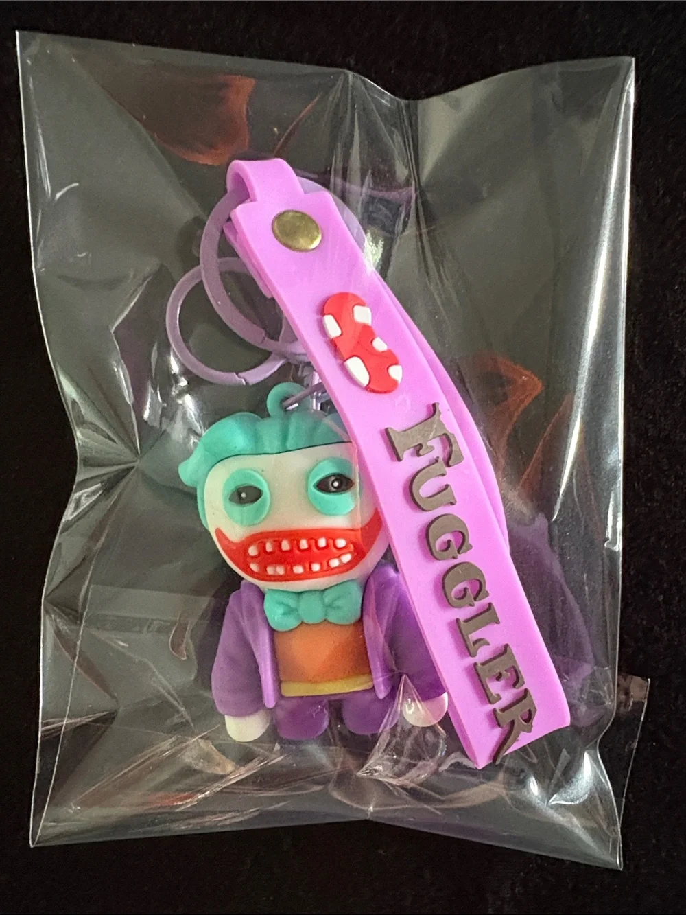 Purple Joker Fuggler Silicone Keychain Bag Charm with Teal Hair and Strap
